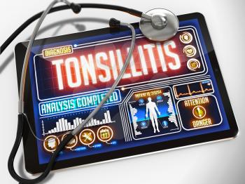 Tonsillitis - Diagnosis on the Display of Medical Tablet and a Black Stethoscope on White Background.