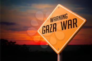 Gaza War on Warning Road Sign on Sunset Sky Background.
