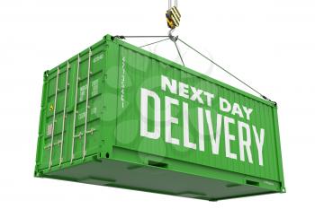 Next Day Delivery - Green Cargo Container hoisted by hook, Isolated on White Background.
