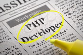 PHP Developer Vacancy in Newspaper. Job Seeking Concept.
