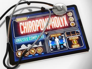 Chiropompholyx - Diagnosis on the Display of Medical Tablet and a Black Stethoscope on White Background.