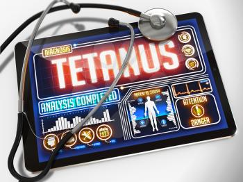 Tetanus - Diagnosis on the Display of Medical Tablet and a Black Stethoscope on White Background.