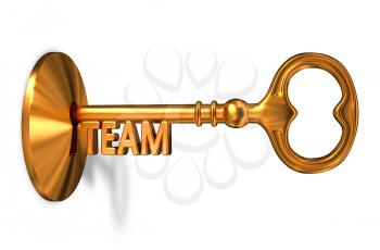 Team - Golden Key is Inserted into the Keyhole Isolated on White Background