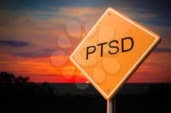 PTSD on Warning Road Sign on Sunset Sky Background.