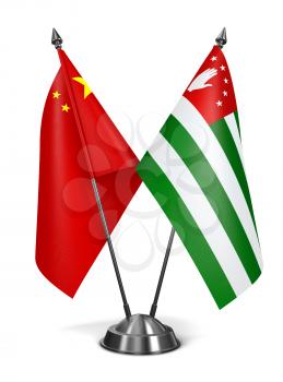 China and Abkhazia - Miniature Flags Isolated on White Background.