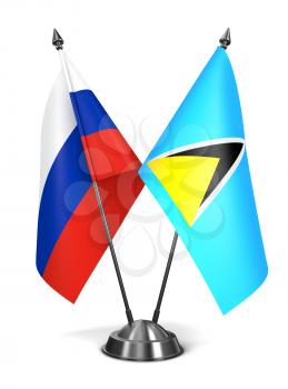 Russia and Saint Lucia - Miniature Flags Isolated on White Background.