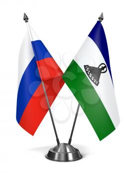 Russia and Lesotho - Miniature Flags Isolated on White Background.
