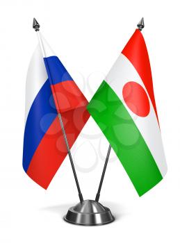 Russia and Niger - Miniature Flags Isolated on White Background.