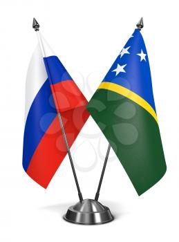 Russia and Solomon Islands - Miniature Flags Isolated on White Background.