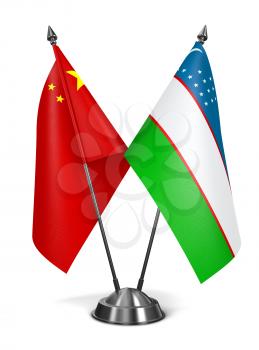 China and Uzbekistan - Miniature Flags Isolated on White Background.