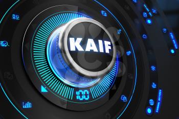 Kaif Button with Glowing Blue Lights on Black Console.