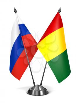 Royalty Free Clipart Image of a Russia and Guinea Miniature Flags