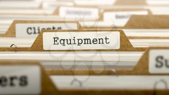 Royalty Free Clipart Image of Equipment Text on a File Folder