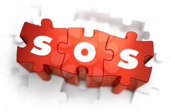 Royalty Free Clipart Image of SOS Text on Puzzle Pieces