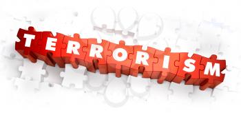 Royalty Free Clipart Image of Terrorism Text on Puzzle Pieces