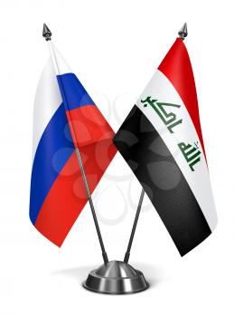 Russia and Iraq - Miniature Flags Isolated on White Background.