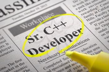 Sr. C plus Developer Vacancy in Newspaper. Job Seeking Concept.