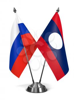 Russia and Laos - Miniature Flags Isolated on White Background.