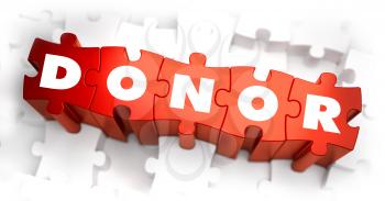 Donor - White Word on Red Puzzles on White Background. 3D Illustration.