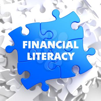 Financial Literacy on Blue Puzzle on White Background.
