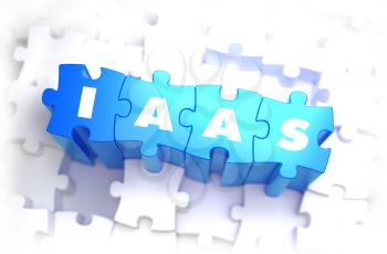 IaaS - White Word on Blue Puzzles on White Background. 3D Illustration.