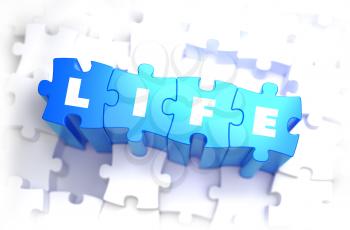Life - Text on Blue Puzzles on White Background. 3D Render. 