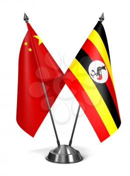 China and Uganda - Miniature Flags Isolated on White Background.