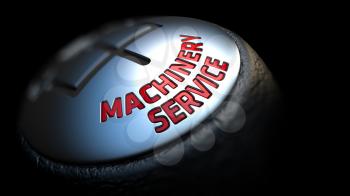 Machinery Service - Red Text on Car's Shift Knob on Black Background. Close Up View. Selective Focus.
