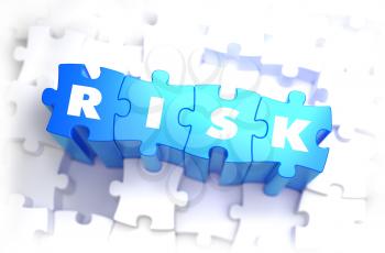 Risk - White Text on Blue Puzzles and Selective Focus. 3D Render. 