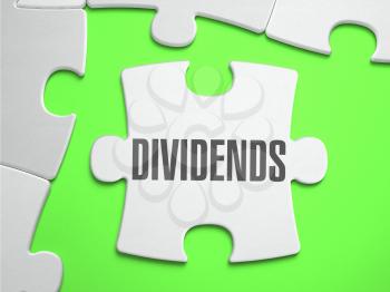 Dividends  - Jigsaw Puzzle with Missing Pieces. Bright Green Background. Close-up. 3d Illustration.
