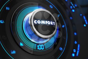 Comfort Regulator on Black Control Console with Blue Backlight. Improvement, Regulation, Control or Management Concept.