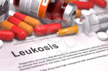 Leukosis - Printed Diagnosis with Blurred Text. On Background of Medicaments Composition - Red Pills, Injections and Syringe.