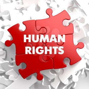 Human Rights on Red Puzzle on White Background.