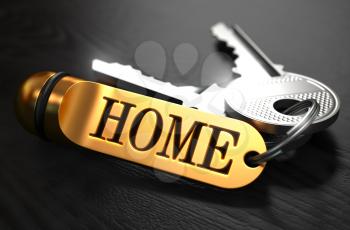 Keys with Word 'Home' on Golden Label over Black Wooden Background. Closeup View, Selective Focus, 3D Render.