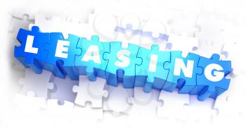 Leasing - Text on Blue Puzzles on White Background. 3D Render. 