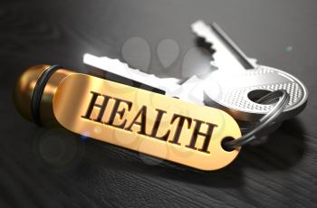 Keys to Health - Concept on Golden Keychain over Black Wooden Background. Closeup View, Selective Focus, 3D Render.