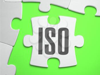 ISO - International Organization for Standardization - Jigsaw Puzzle with Missing Pieces. Bright Green Background. Close-up. 3d Illustration.