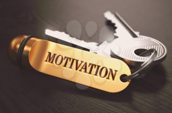 Keys to Motivation - Concept on Golden Keychain over Black Wooden Background. Closeup View, Selective Focus, 3D Render. Toned Image.