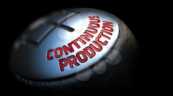 Continuous Production - Red Text on Black Gear Shifter with Leather Cover. Close Up View. Selective Focus.