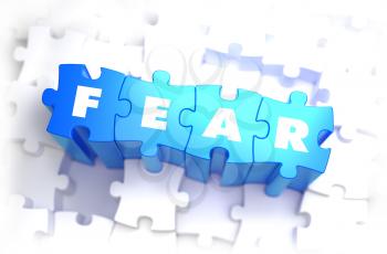 Fear - White Word on Blue Puzzles on White Background. 3D Illustration.
