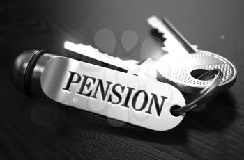 Pension Concept. Keys with Keyring on Black Wooden Table. Closeup View, Selective Focus, 3D Render. Black and White Image.