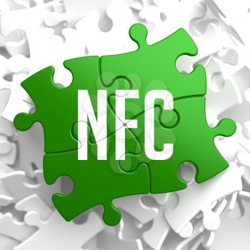 NFC on Green Puzzle on White Background.