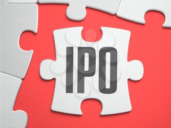 IPO - Initial Public Offering - Text on Puzzle on the Place of Missing Pieces. Scarlett Background. Close-up. 3d Illustration.