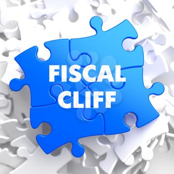 Fiscal Cliff on Blue Puzzle on White Background.