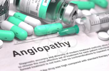 Angiopathy - Printed Diagnosis with Mint Green Pills, Injections and Syringe. Medical Concept with Selective Focus.