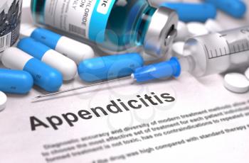 Diagnosis - Appendicitis. Medical Concept with Blue Pills, Injections and Syringe. Selective Focus. Blurred Background.