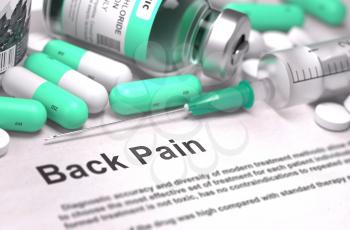 Back Pain - Printed with Mint Green Pills, Injections and Syringe. Medical Concept with Selective Focus.