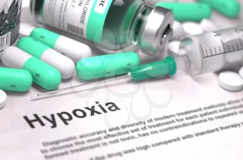 Hypoxia - Printed Diagnosis with Mint Green Pills, Injections and Syringe. Medical Concept with Selective Focus.