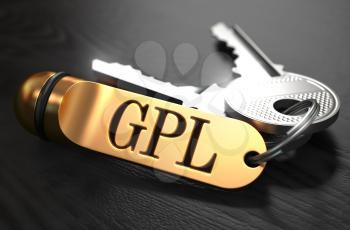 GPL - General Public License - Bunch of Keys with Text on Golden Keychain. Black Wooden Background. Closeup View with Selective Focus. 3D Illustration.