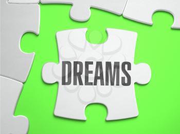 Dreams - Jigsaw Puzzle with Missing Pieces. Bright Green Background. Close-up. 3d Illustration.